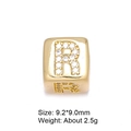 Close-up of gold plated 8mm letter R bead charm with micro-paved cubic zirconia - Letter R