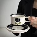 Handheld vintage ceramic coffee cup and saucer set with black tulip floral pattern - Black Tulip