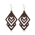 Macro detail of dark brown geometric hollow wooden earrings on a clean white background - Style 26