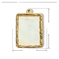 Macro view of rectangular gold stainless steel pendant with white shell inlay and 23mm height - YE450 Rectangle Gold Shell