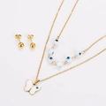 Detail of evil eye necklace and gold stud earrings set featuring a white butterfly pendant - Gold White