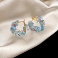 Detailed close-up of light blue natural stone beaded hoop earrings on champagne silk fabric - Gold-Blue Stone-Hoop