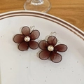 Detail of dark brown mesh flower earrings with rhinestones on a white ceramic plate - Ear Hook-Coffee