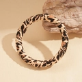 Vintage open armband van kunstleer met luipaardprint en gewikkelde leertextuur - Armring - Luipaardprint (Dun)
