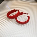 Detailed view of red textured hoop earrings with snake skin pattern on a white surface - Red Snakeskin Texture Hoop (32# Silver Pin)