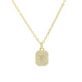 Macro shot of gold square pendant featuring a micro-paved zircon letter Y and fine chain - Necklace Y