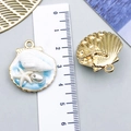 Detailed size measurement of seashell and starfish pendants using a metric ruler scale - Light Blue Gold-Sprinkled Pearl Starfish Conch-23572
