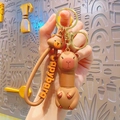 Brown silicone Capybara keychain featuring a retractable neck and golden metal ring - Pop Tube Capybara - Brown