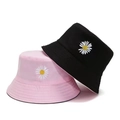 Detail of embroidered white daisy flowers on black and pink cotton bucket hats - One Size / Pink and Black
