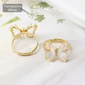 Adjustable golden butterfly ring with transparent white crystals and sparkling stones - Clear White