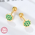 Macro view of 925 sterling silver flower earrings with green enamel and screw back - Gold Green