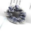Blue plaid ribbon bow scrunchie for women with high-quality fabric texture - Gentle Cut Blue