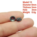 Detail of 8mm vintage metal spacer bead showing 3mm hole size and relief texture - 13# (8x3mm)