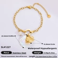 Bracelet doré en acier inoxydable avec breloques coquillage et poisson 18k - Perle Poisson Coquille Irisée (SL41227)