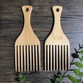 Set of two wide-tooth bamboo beard combs with hanging holes on dark wood surface - Bamboo Insert Comb 16x6CM