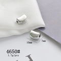 Macro shot of silver bean jewelry charm with size markings of 10mm by 7mm for DIY crafts - Silver Bean Shape DIY Accessory (4650#)