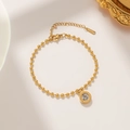 Elegante gouden titanium stalen kralenarmband met Romeinse cijfer hanger en een kristal - Goud