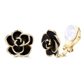 Detail of gold floral ear clips with black enamel and comfort silicone pads for non-pierced ears - Gold Black Flower