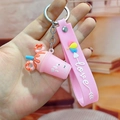 Pink cartoon milk tea cup keychain with heart details and a silicone Love wrist strap - Ice Cream Cup / Pink