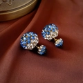 Detail of blue and white crystal double-sided stud earrings on dark silk fabric - Blue Rhinestone Double-Sided (HE17209)