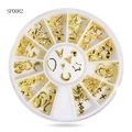 Golden metal nail art charms featuring moon, star, and heart shapes in a storage wheel - Gold Geometric Metal Pieces (sp0082)