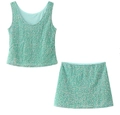 Dettaglio di un set a due pezzi di paillettes verde menta con top senza maniche e gonna - S / Verde