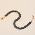 18K gold plated stainless steel bracelet featuring blue rectangular crystals and S-curve links - Gold-Blue Bracelet