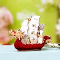 Red dragon boat keychain with white sail and golden accents for wealth and luck - Sailing Theme Red
