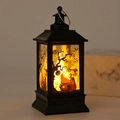 Detail of Halloween lantern with witch pattern and warm LED candlelight effect - Witch