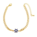 Gold Cuban link bracelet featuring a blue and white zircon flower pendant charm - Blue