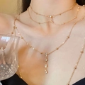 Close-up of golden body chain with sparkling rhinestones and delicate metal beads on model - 22401 Jewelry Set-Gold