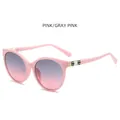 Pink cat-eye sunglasses with grey-pink gradient lenses and hexagon temple details - Pink Frame Gray Pink Lens