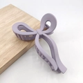 Matte purple bow hair claw clip for women featuring a minimalist ribbon style design - Matte Light Purple
