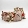 Pink cotton drawstring bag with red strawberry pattern and Daisy text design - 10x14cm / Pink Strawberry
