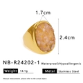 Macro shot of gold stainless steel ring featuring crushed pink natural stone inlay detail - Pink Large Face Stone Chip Ring (NB-R24202-1)