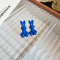 Detailed close-up of blue flocked rabbit earrings with matte finish on a glass tray - 12# Silver Pin - Blue Rabbit