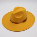 Detail of ginger yellow wool fedora hat featuring brown leather band and gold buckle - Yellow (Heart Buckle)