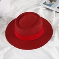Chic red flat-top woven straw hat with matching ribbon on white linen background - M (56-58cm) / Burgundy