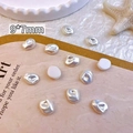 Macro detail of 9x7mm baroque irregular resin pearls for DIY nail art and jewelry - Creamy White (9*7mm)