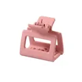 Close-up of matte pink square hair claw clip with internal teeth and metal spring - Korean Pink