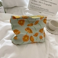 Elegante Kosmetiksche mit orangefarbenem Mohnblumenmuster und gelbem Reißverschluss - Calla-Lilie Orange Blumenmuster