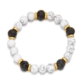 Detailed macro view of white marble beads and black lava stones with gold spacers - White Marble / Black Volcanic Stone
