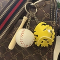 Miniature baseball keychain with bat, ball, and yellow glove on a patterned handbag - 3.5CM White Ball Yellow/Black