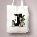 White canvas tote bag featuring a Christmas themed letter J with deer and pine decor - Letter J