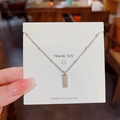 Silver rectangle pendant necklace in durable titanium steel on a white jewelry card - X380 Silver Rectangular Column