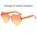 Frameless heart-shaped sunglasses with orange-yellow gradient lenses and orange arms - Gradient Orange Yellow
