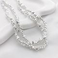 Dettaglio di perline distanziatrici triangolari argentate per creazione gioielli fai-da-te - Perla di Pietra Irregolare (13#) / 9*4mm / Argento
