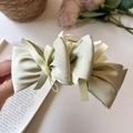 Elegante lichtgroene satijnen strik haarklem met glanzende zijden afwerking voor dames - Strik Haarklem / Groen