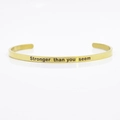 4mm gold stainless steel cuff bangle engraved with Stronger than you seem text - Stronger than you seem