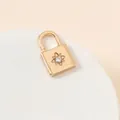 Close-up of a gold lock charm with a sparkling rhinestone star on a white pedestal - Star Rhinestone Lock (24#)